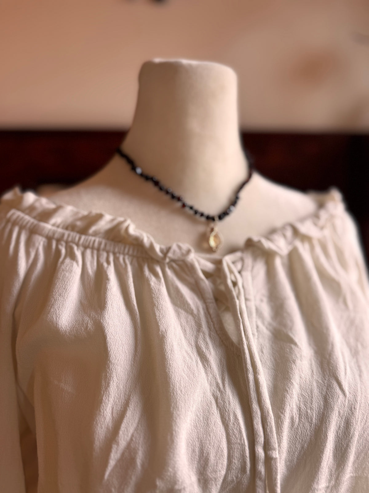 Size Small off shoulder embroidered hobbit top