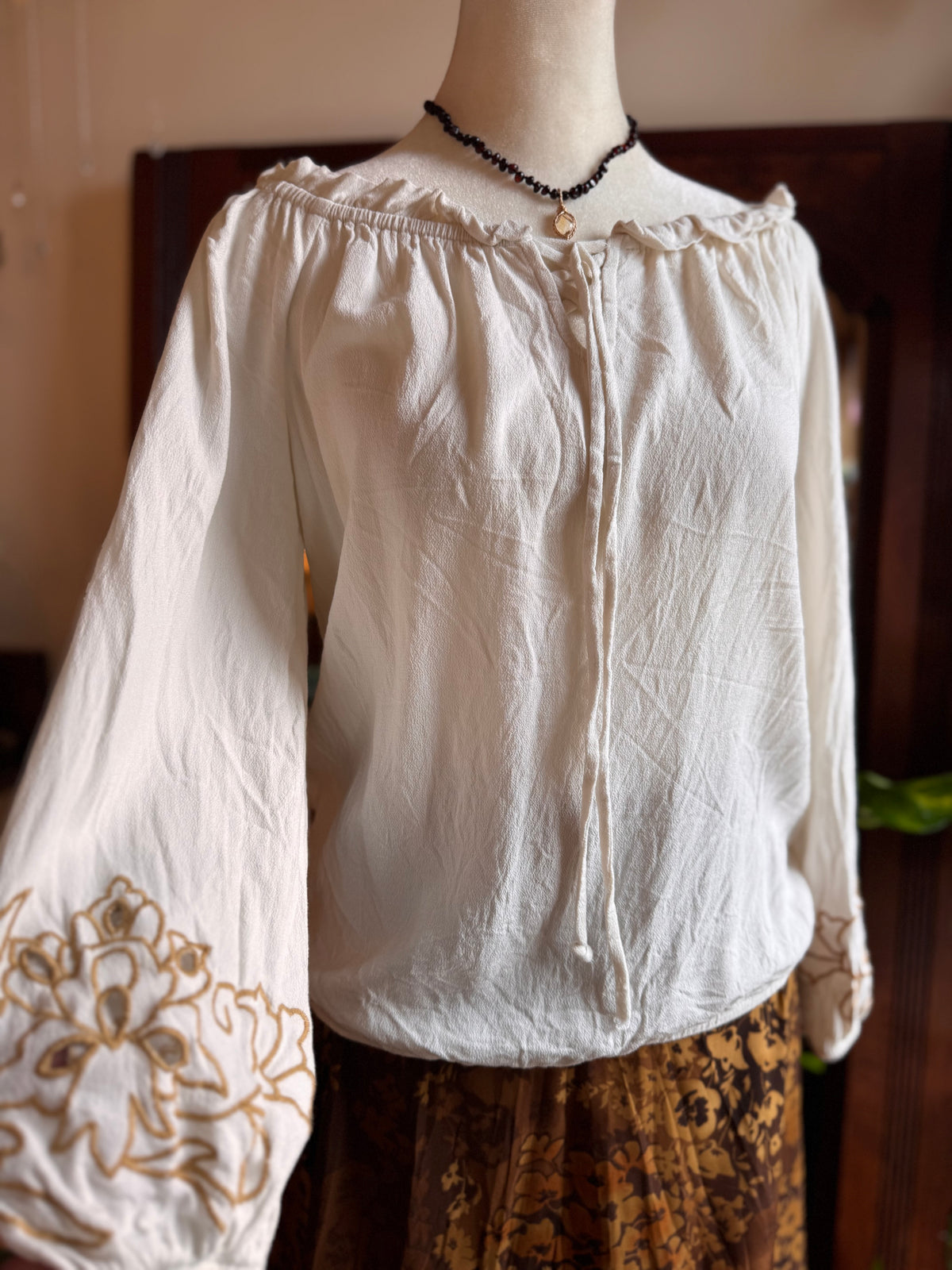 Size Small off shoulder embroidered hobbit top