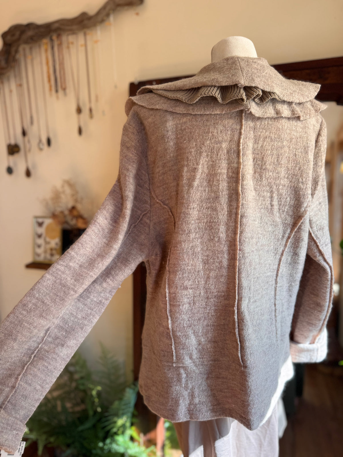 Size XL boiled wool frilly sweater