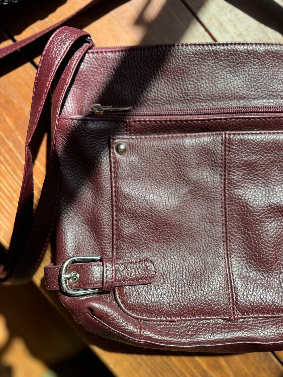 Burgundy cross body bag